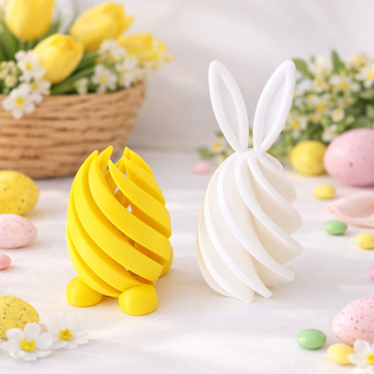 Two decorative items shaped like a yellow banana and a white rabbit on a festive background with Easter eggs and flowers.