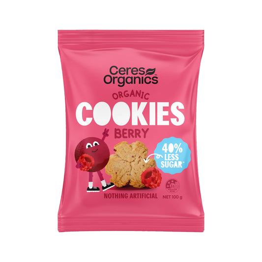 A pink stand-up pouch of Ceres Organics Organic Cookies Berry, featuring a cartoon raspberry character, a cookie illustration, and a blue badge indicating 40% less sugar.