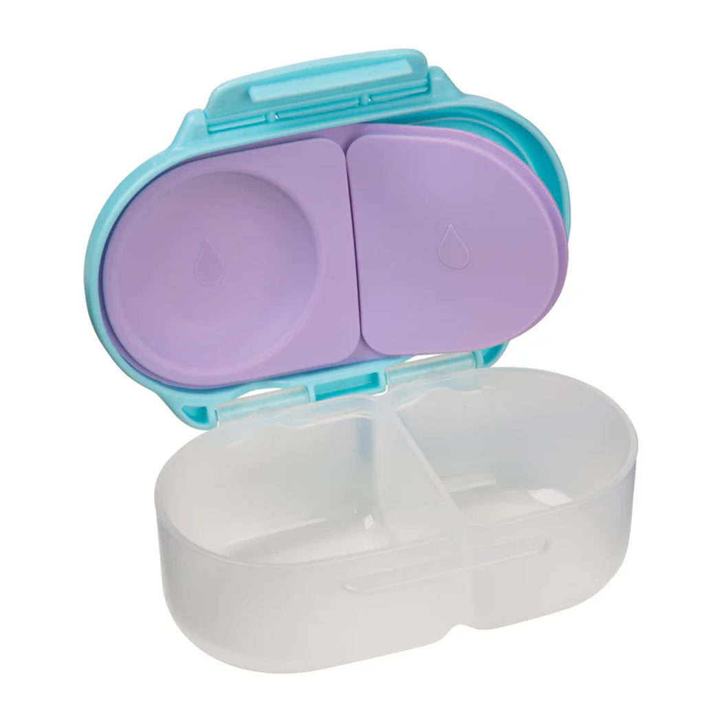 Contact lens case with purple compartment and clear base on a white background