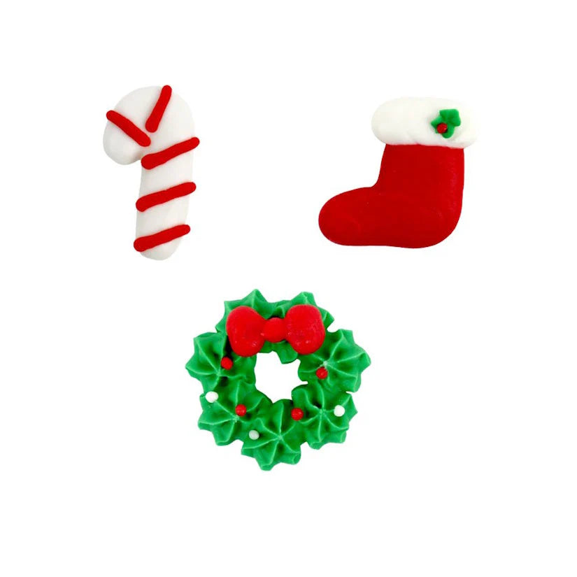 Three Christmas-themed cookies on a white background: a candy cane, a stocking, and a wreath.