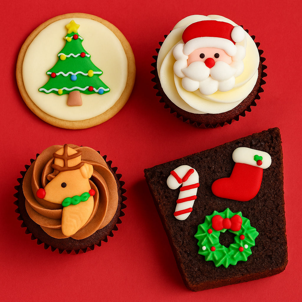 Four Christmas-themed cupcakes on a red background