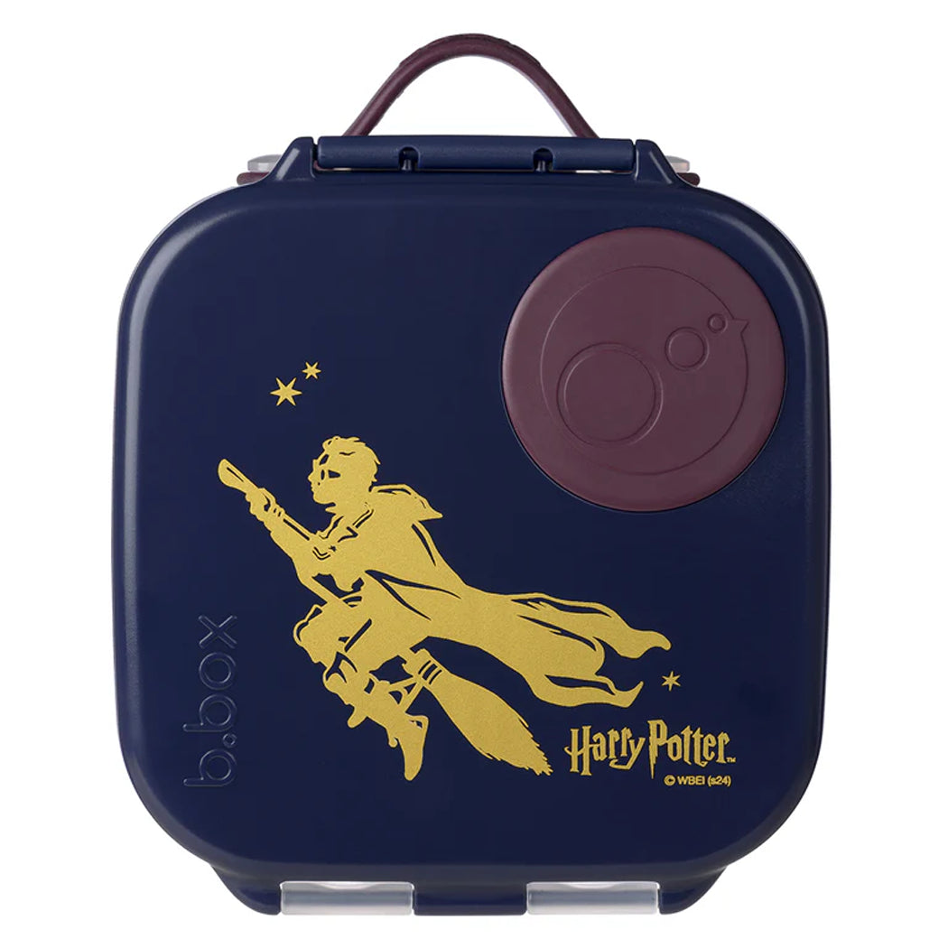 Blue lunch box with gold silhouette of a person flying and 'Harry Potter' branding.