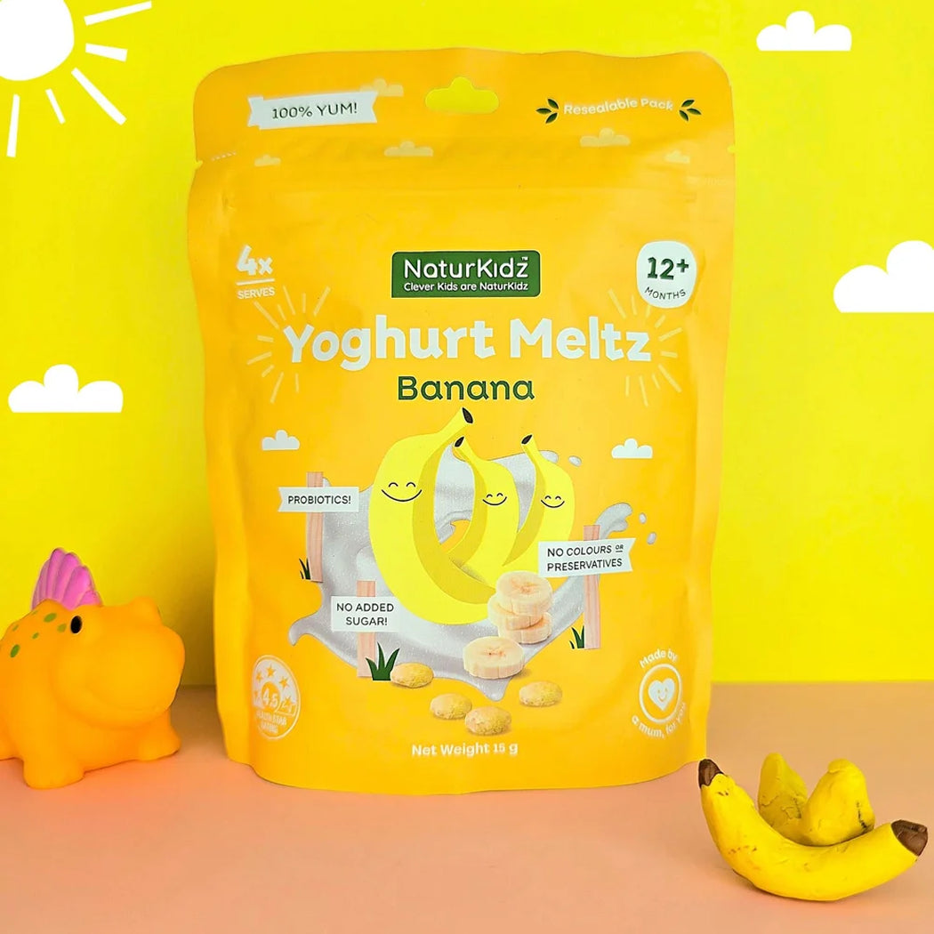 NaturKidz Yoghurt Meltz Banana package on a yellow background with cartoon bananas and a small toy duck.