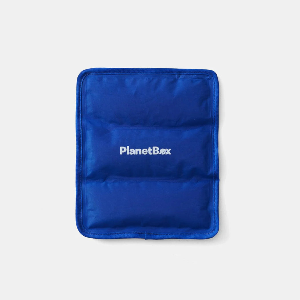 Blue insulated bag with 'PlanetBox' logo on a light gray background