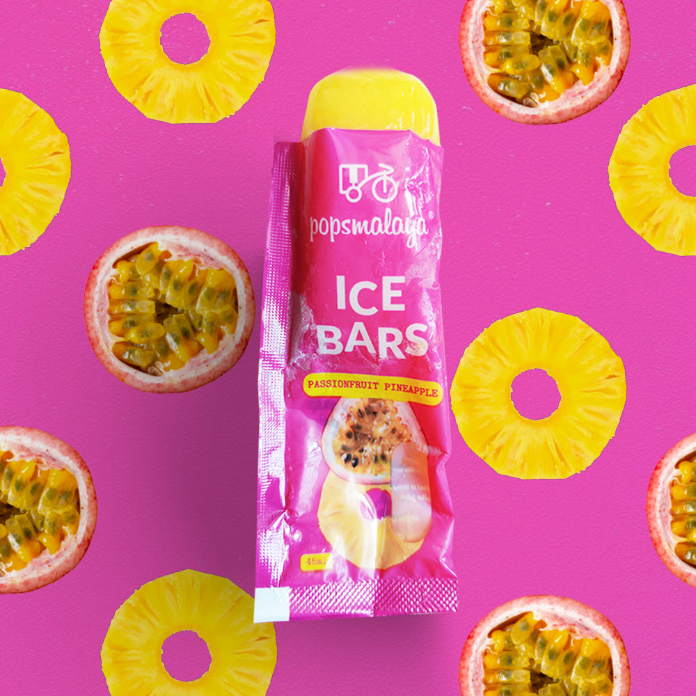 Popsmala ice bars packaging with pineapple slices on a pink background