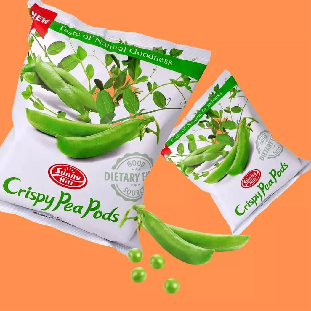 Two packages of Sunny Hill Crispy Pea Pods on an orange background