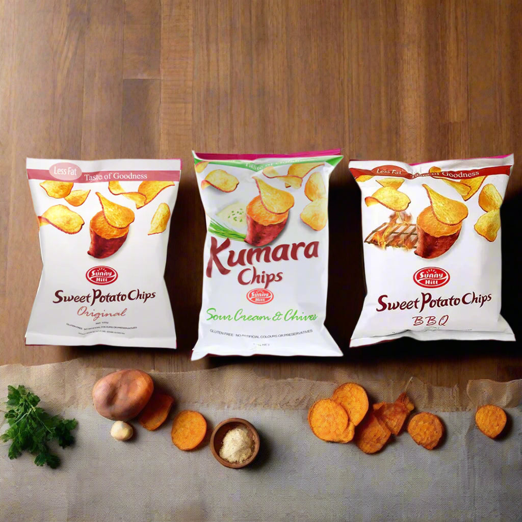 Three packages of Kumara Chips on a white background