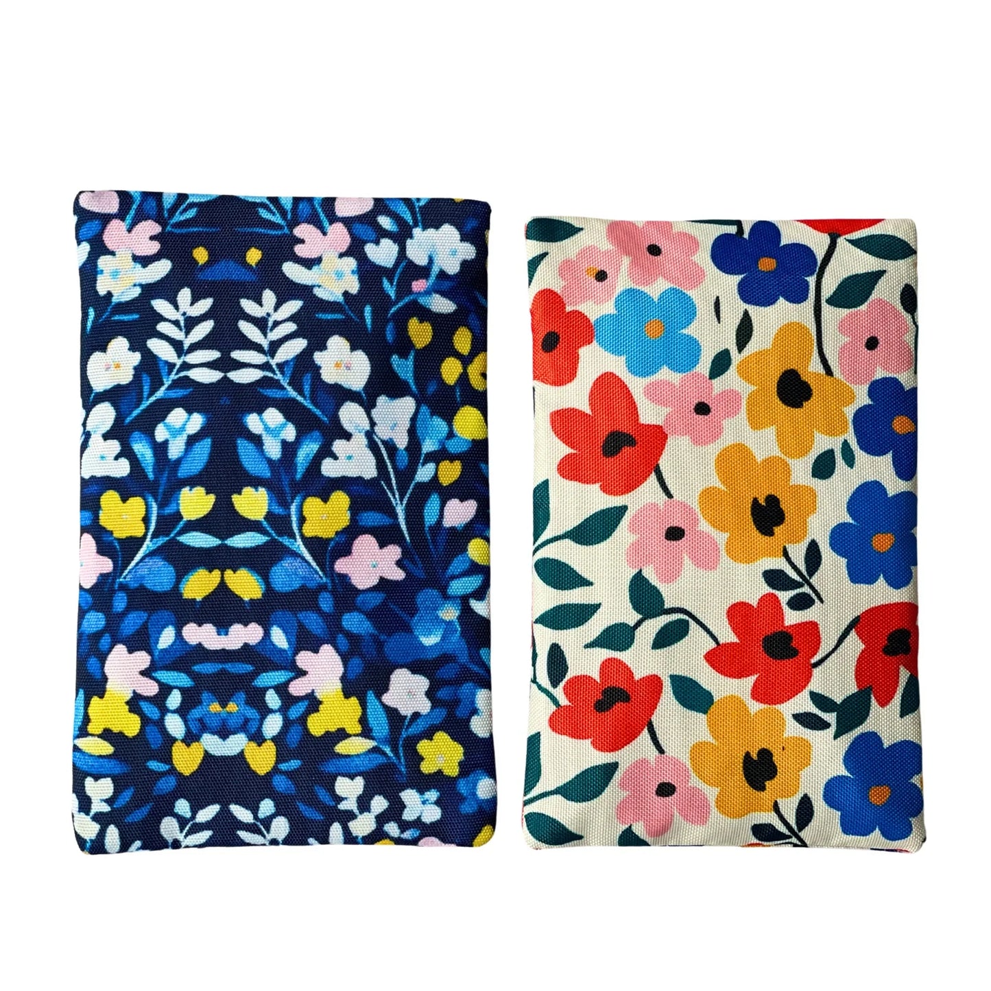 Two floral-patterned pouches on a white background