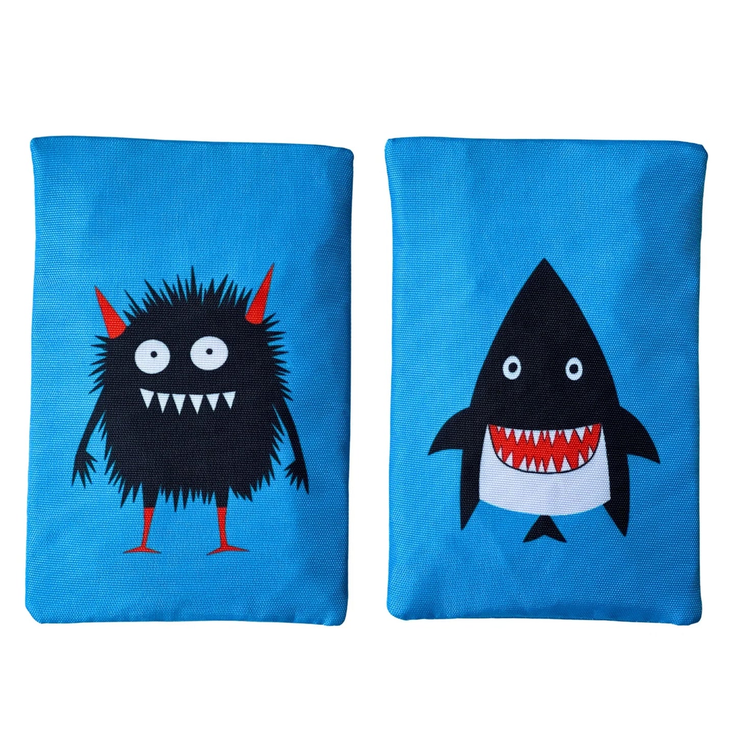 Two blue bags with a black monster and shark design on a white background