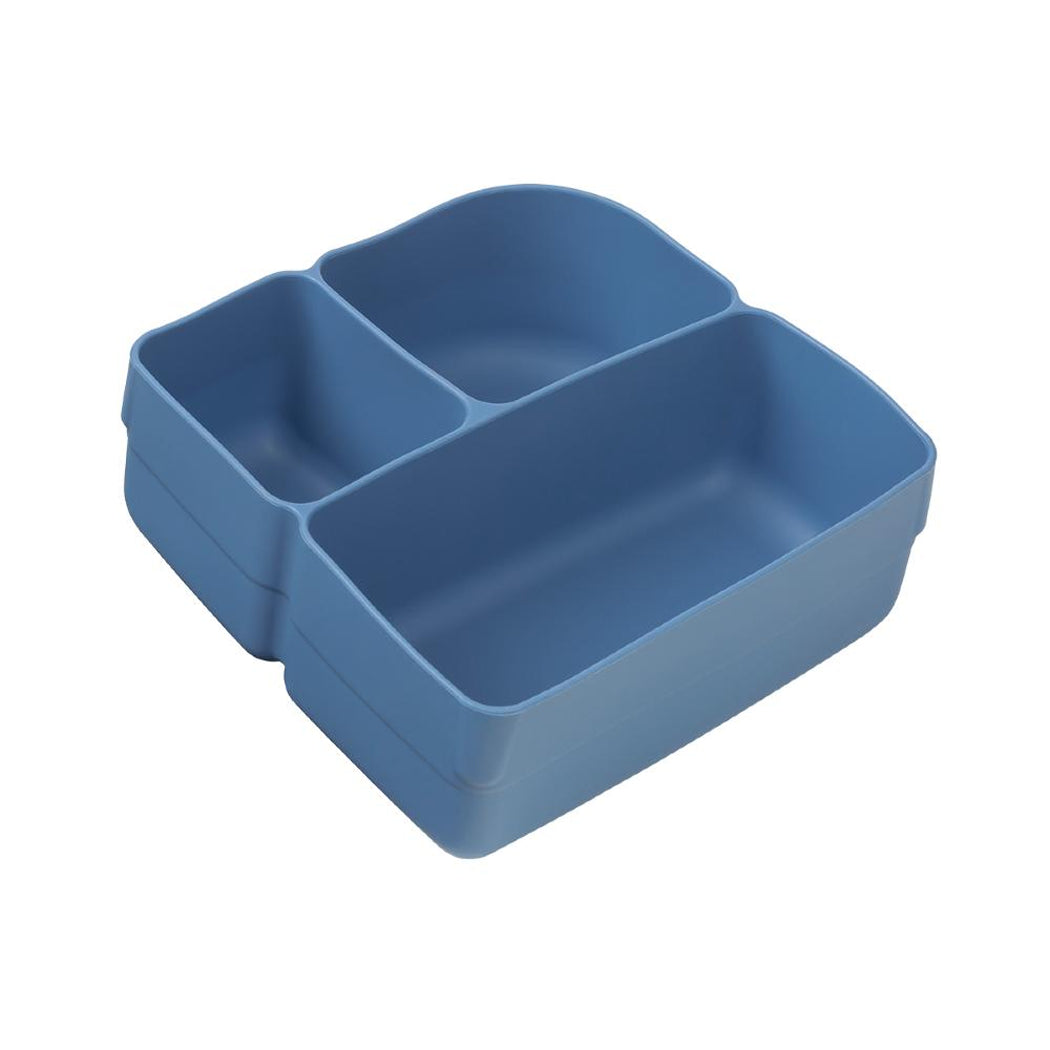 Blue plastic compartmentalized tray on a white background