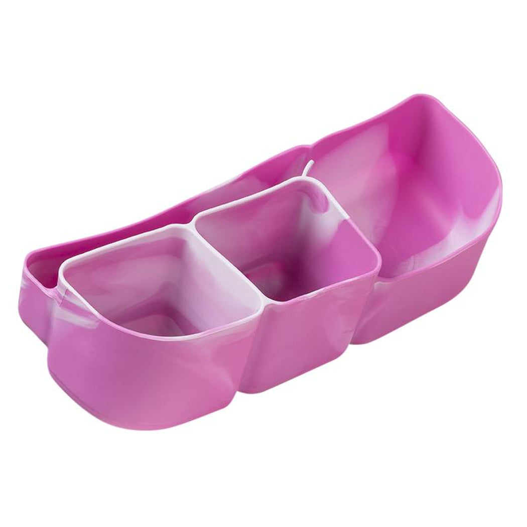 Pink silicone compartmentalised tray on a white background