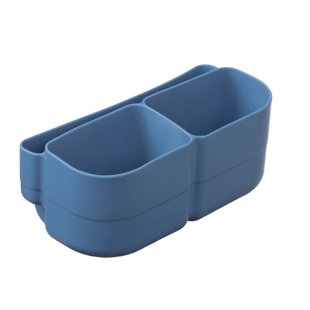 Blue plastic compartmentalized container on a white background
