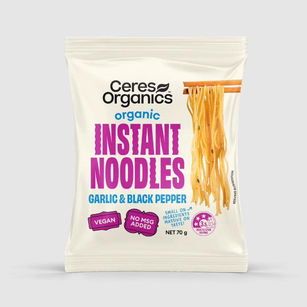 Ceres Organics Organic Instant Noodles Garlic & Black Pepper in a 70g resealable pouch, shown on a light gray background.
