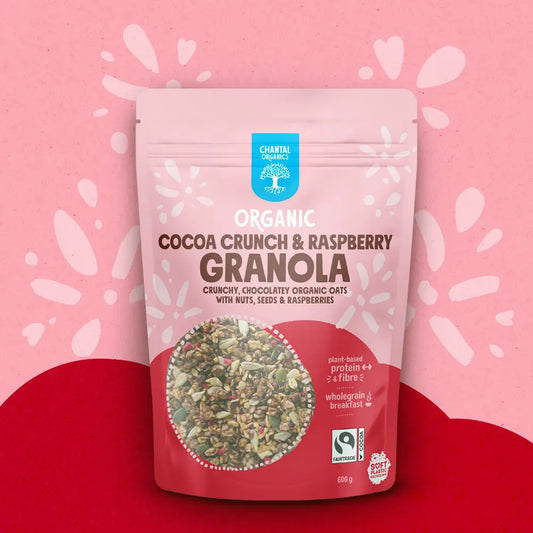 Granola package with pink and red design on a pink background