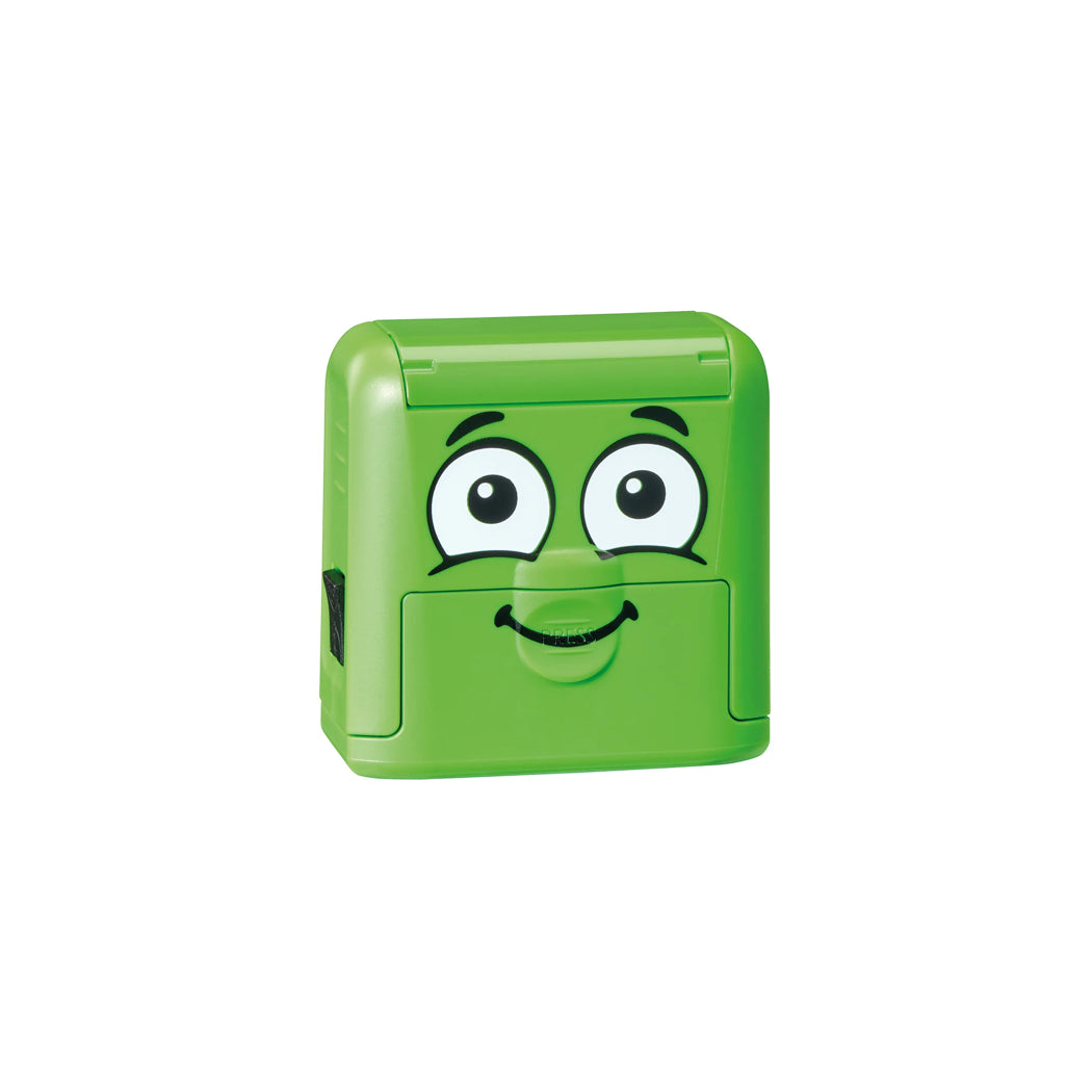 Green rectangular object with a face on a white background