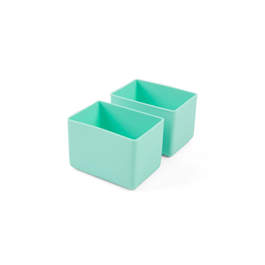 Two turquoise square containers on a white background