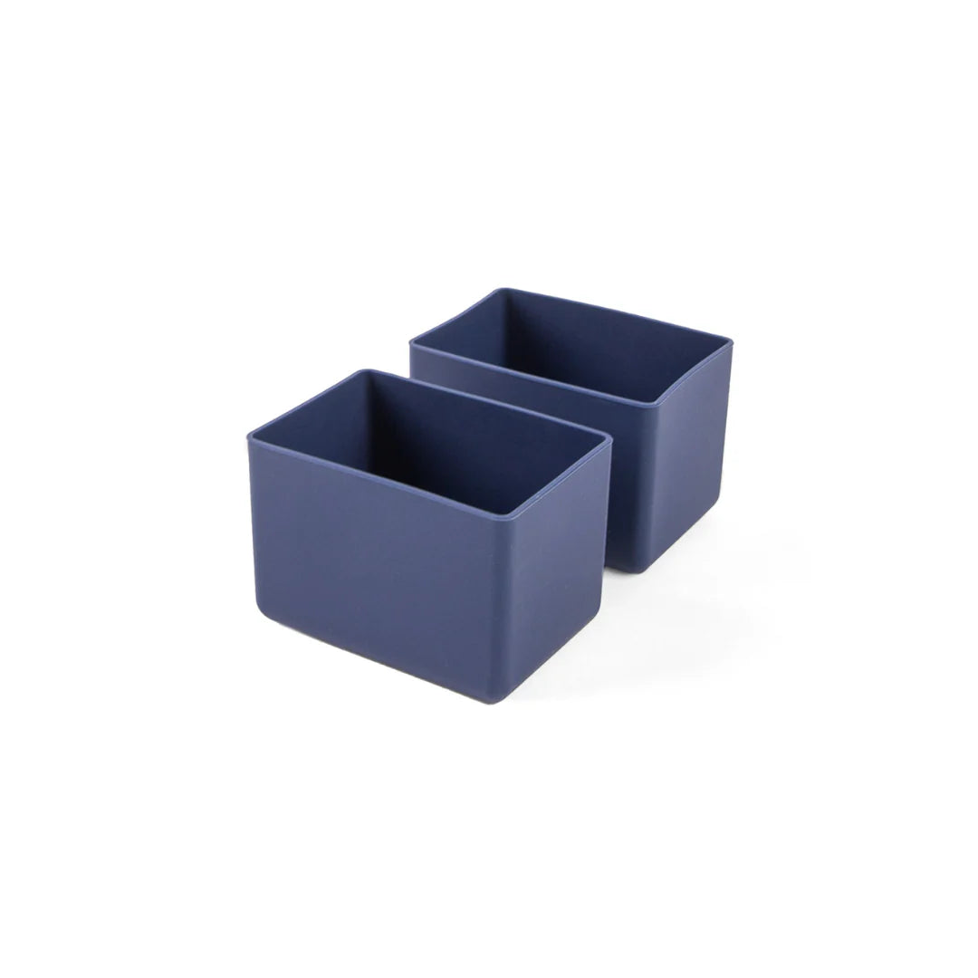 Two blue rectangular containers on a white background