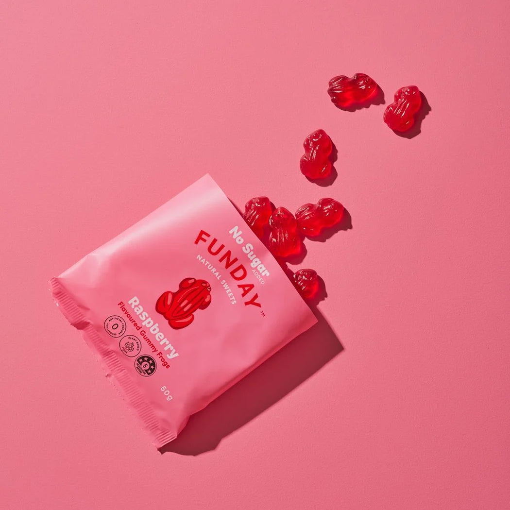 Pink package of Funday gummy bears on a pink background