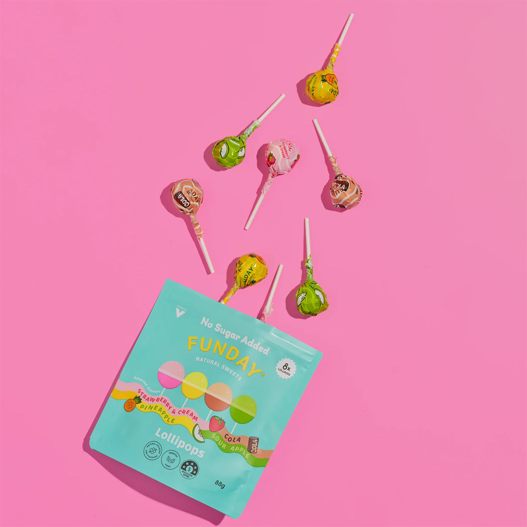 Lollipop package with colorful lollipops on a pink background