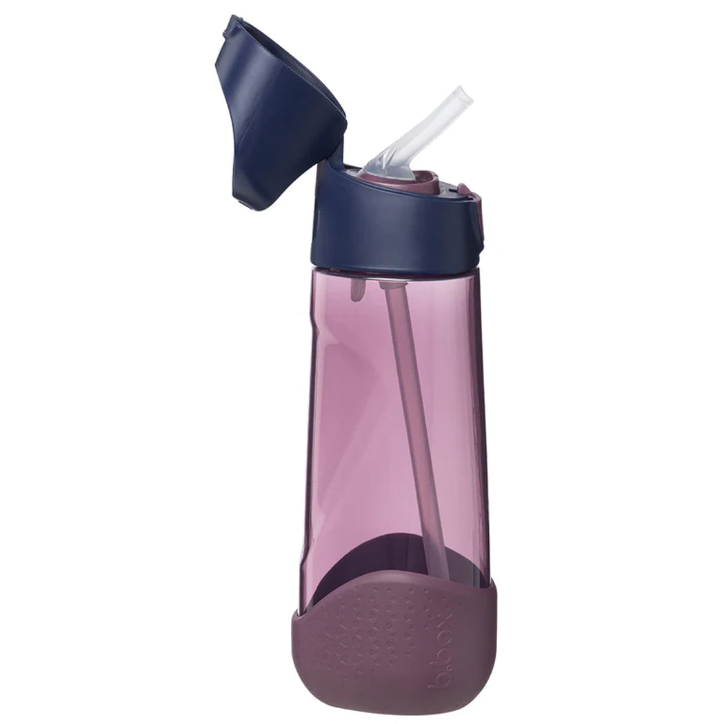 Pink water bottle with a navy blue lid and straw on a white background