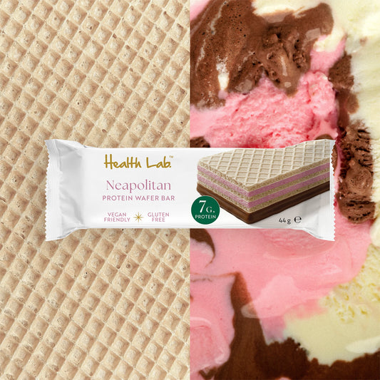 Health Labi Neapolitan protein wafer bar shown in its white wrapper against a split background of waffle texture on the left and pink, brown, and cream ice cream swirls on the right.