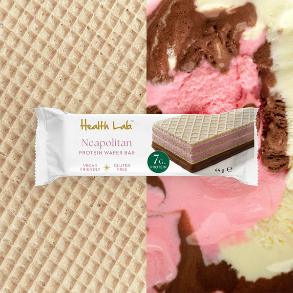 Health Labi Neapolitan protein wafer bar shown in its white wrapper against a split background of waffle texture on the left and pink, brown, and cream ice cream swirls on the right.