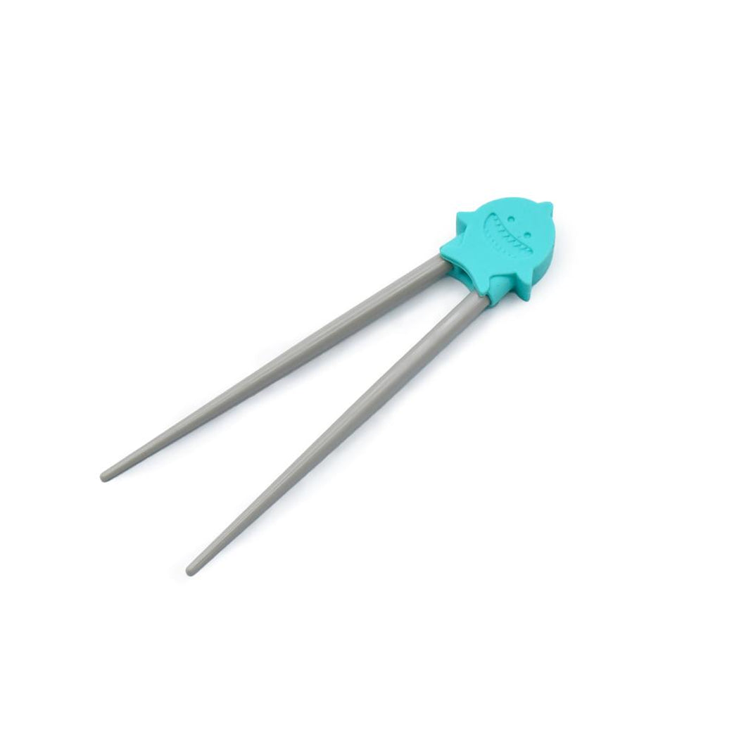 Teal and gray kitchen tool on a white background