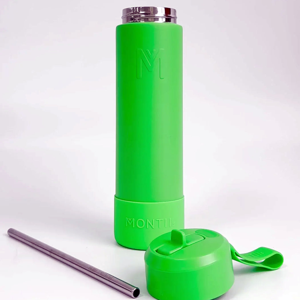 Green water bottle with straw and cap on a white background