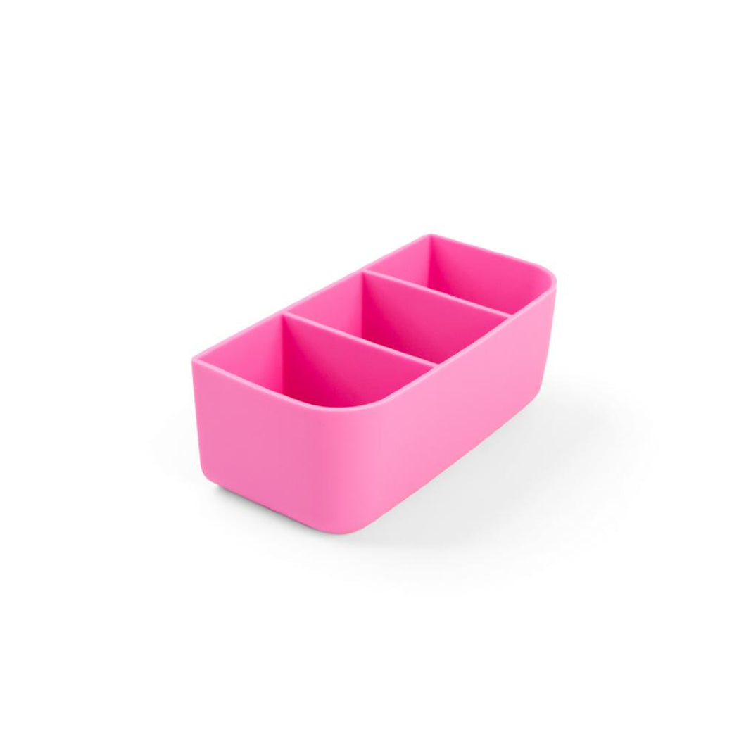 Pink rectangular container with compartments on a white background