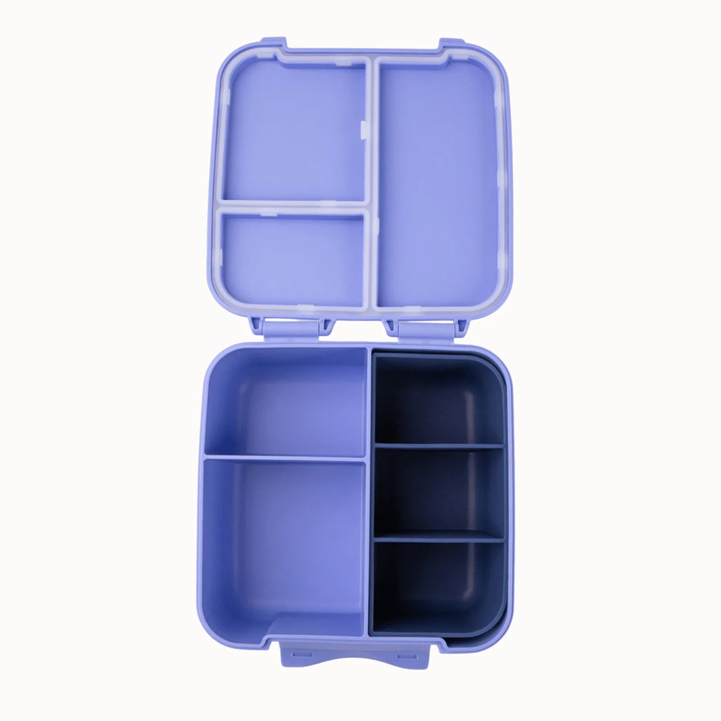 Blue compartmentalized container with lid on a white background