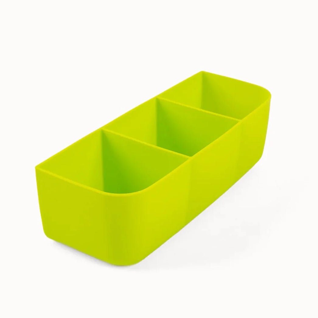 Green rectangular container with compartments on a white background