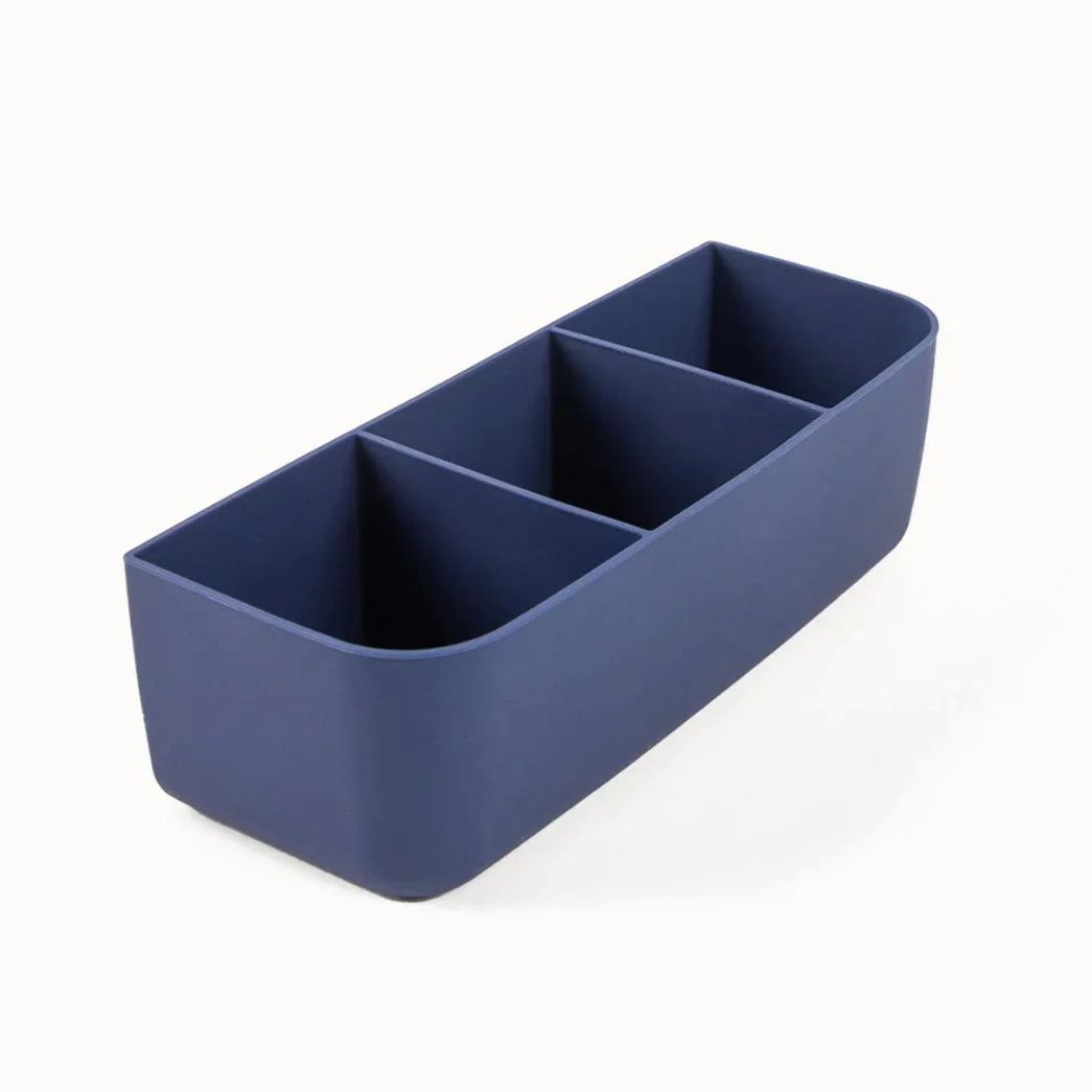 Navy blue rectangular storage bin with compartments on a white background