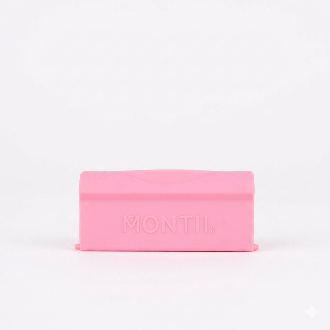 Pink rectangular product with 'MONTII' branding on a white background