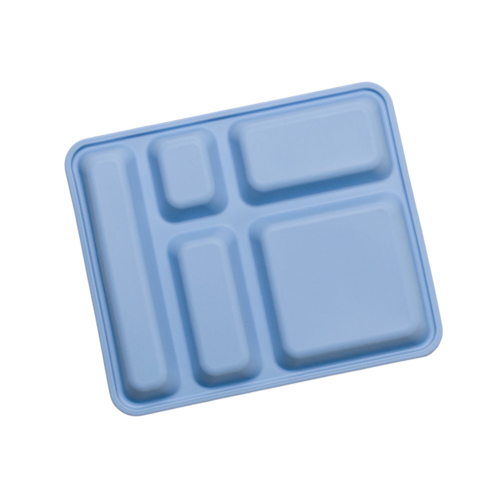 Blue silicone mold with rectangular compartments on a white background
