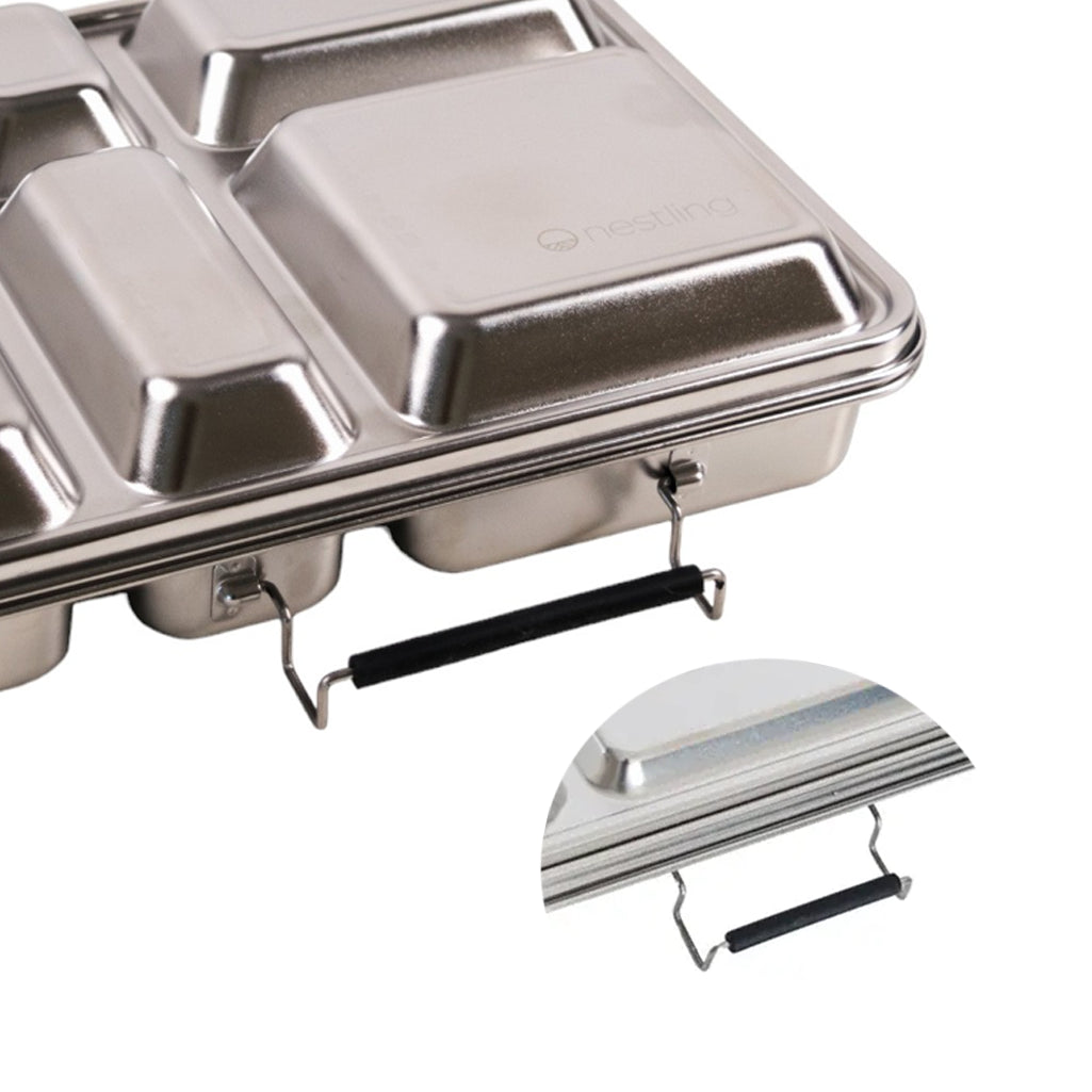 Stainless steel food warming tray with compartments on a white background
