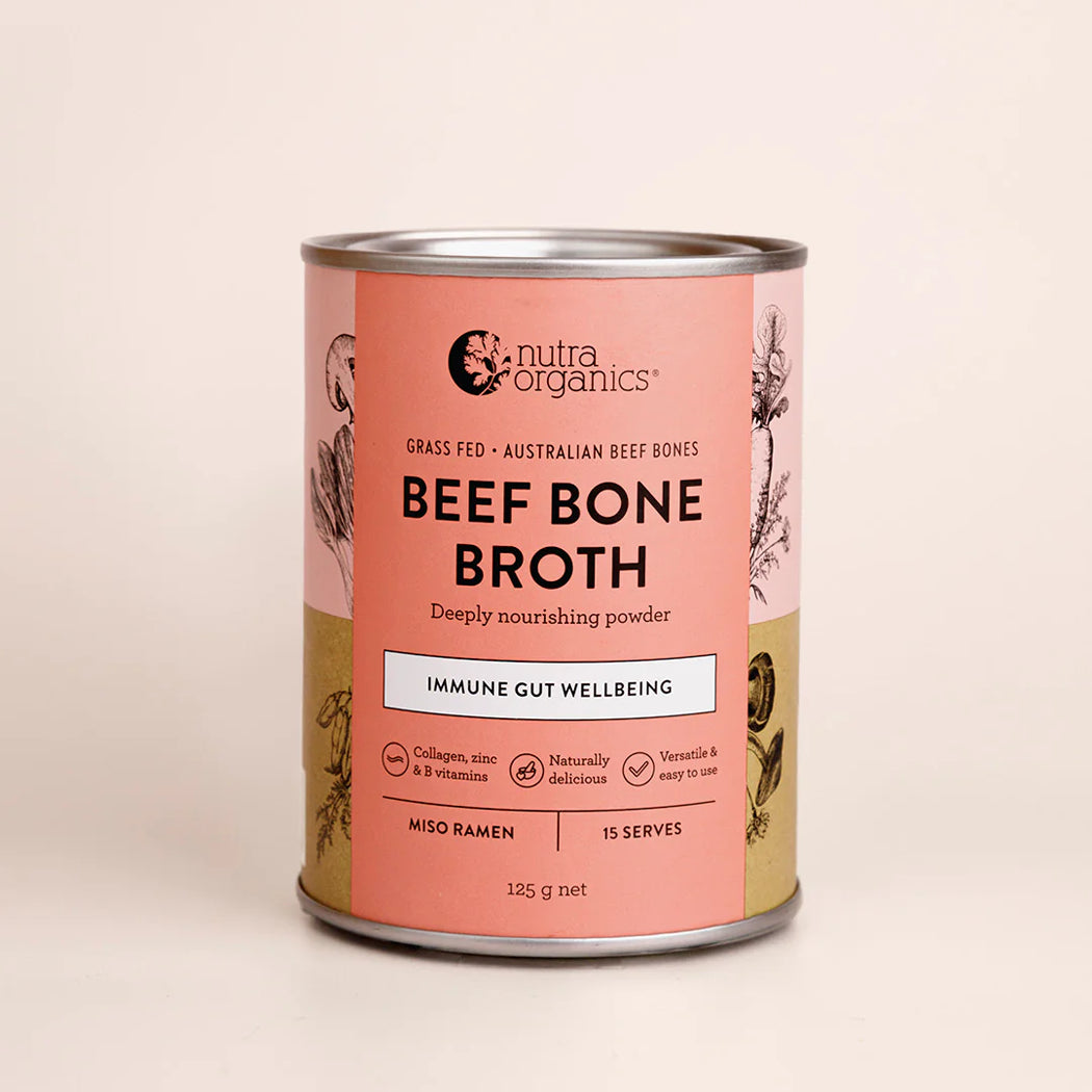 Can of Nutra Organics Beef Bone Broth on a beige background