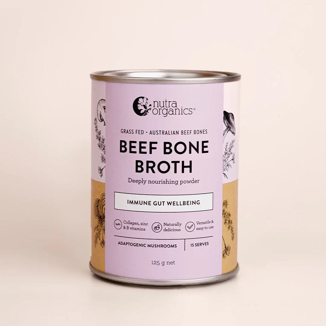 Can of Nutra Organics Beef Bone Broth on a beige background