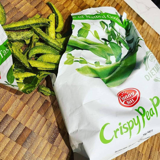 Bag of SunnY Crispy Pea on a woven surface