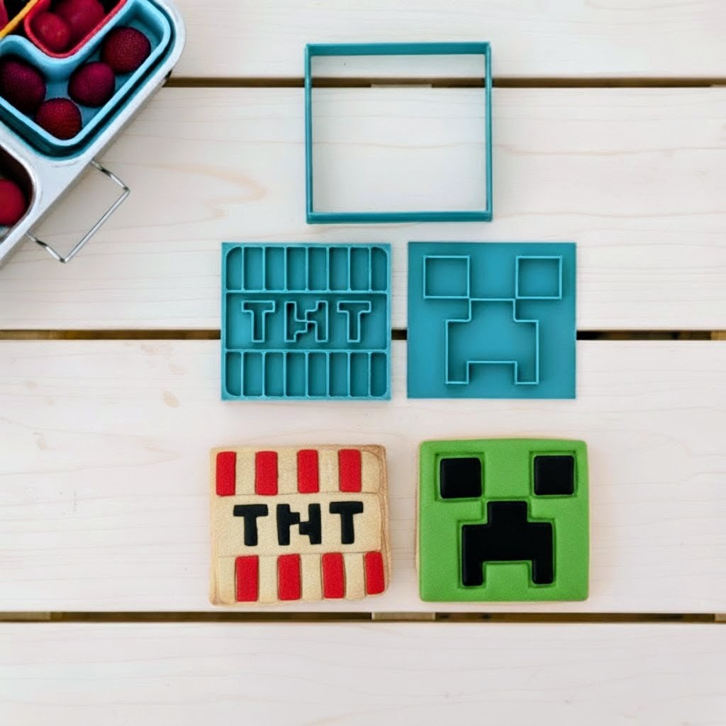 Toy figures and cookie cutters on a light wooden background