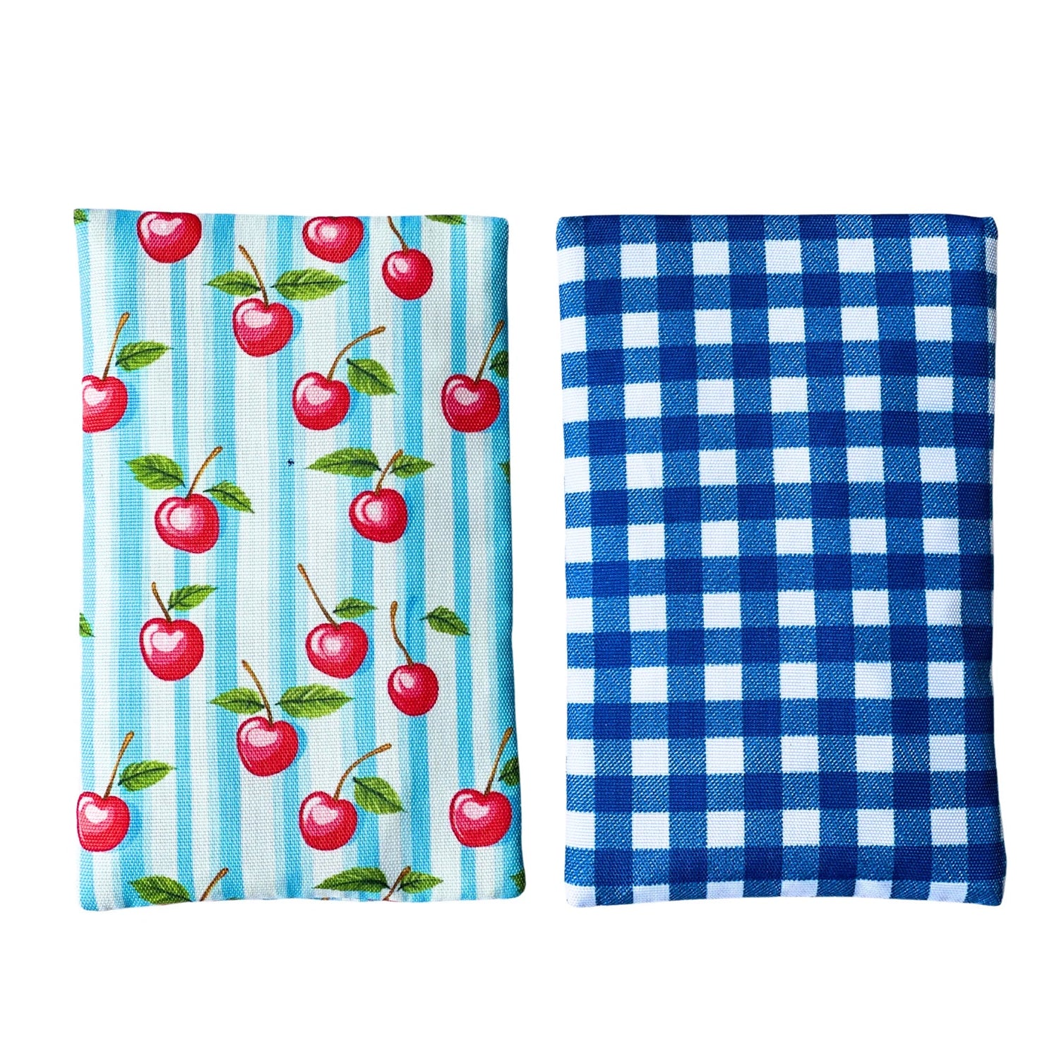 Two fabric towels, one with cherry pattern and blue stripes, the other with blue and white checkered pattern.
