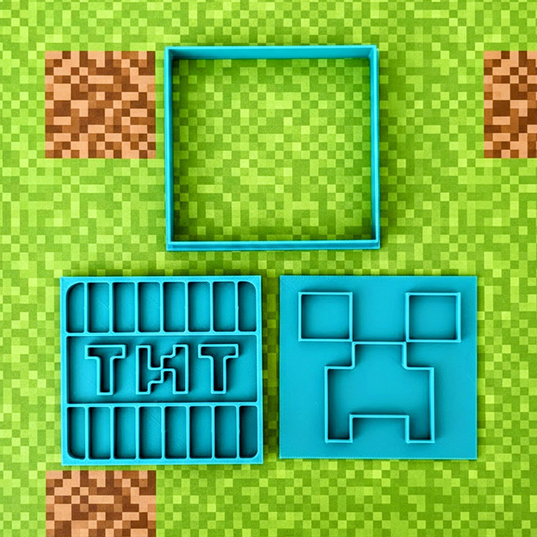 Set of blue silicone molds on a green pixelated background